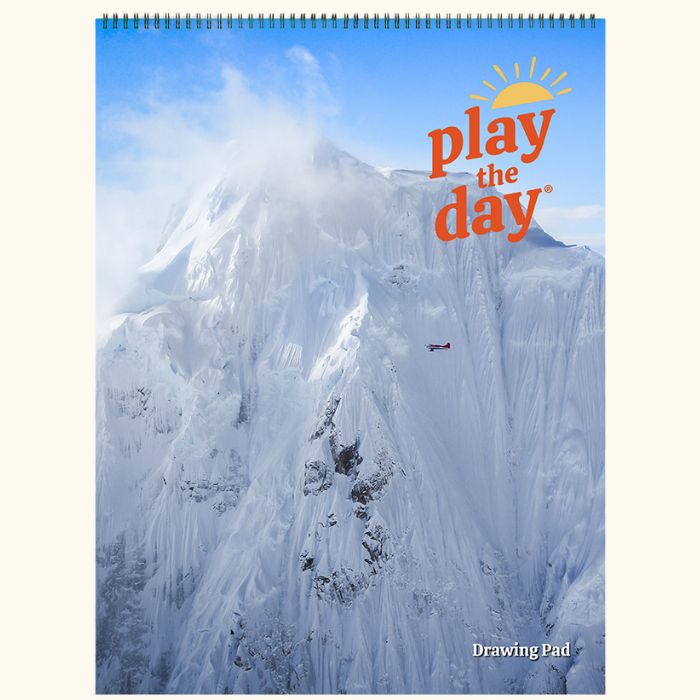 9 x 12 Play the Day® art pad cover showing a scenic flight near Denali in the snowy Alaska Range
