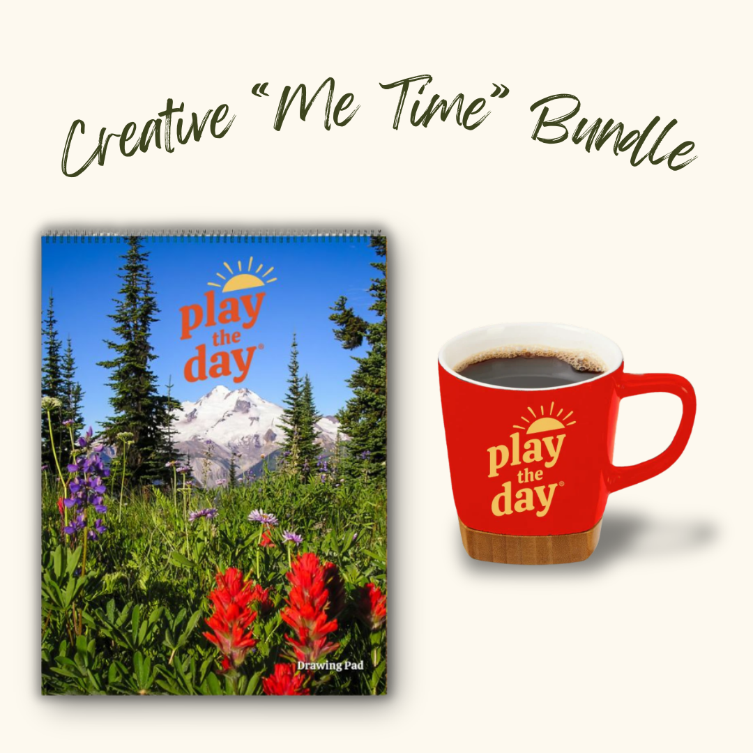Play the Day® Creative “Me Time” Bundle with Glacier Peak and Wildflowers recycled paper art pad and red mug with bamboo coaster.