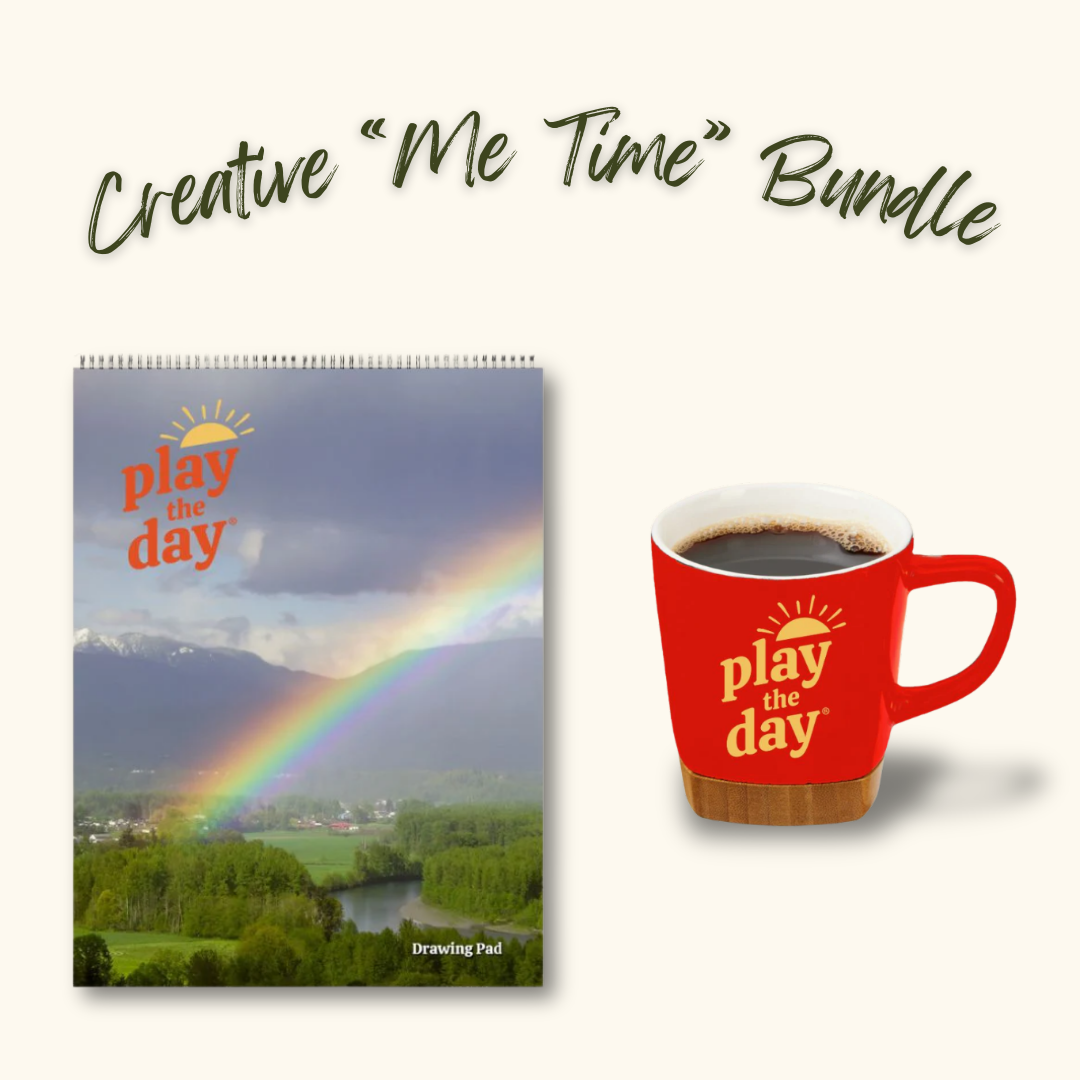 Play the Day® Creative “Me Time” Bundle with Rainbow over Skykomish River recycled paper art pad and red mug with bamboo coaster.