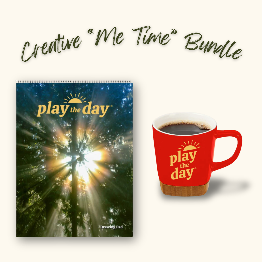 Play the Day® Creative “Me Time” Bundle with Sunlight through Cedars recycled paper art pad and red mug with bamboo coaster.
