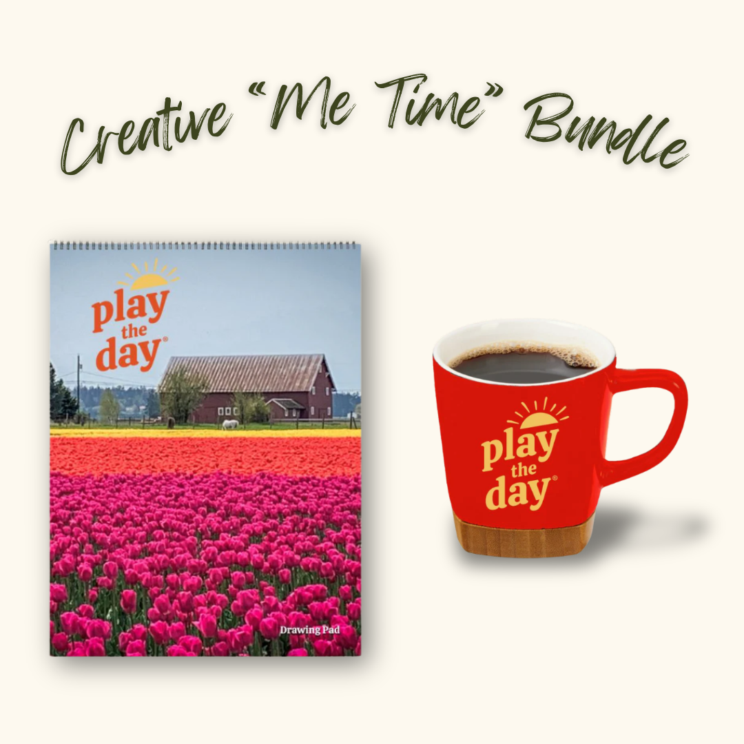Play the Day® Creative “Me Time” Bundle with Tulips in the Skagit Valley recycled paper art pad and red mug with bamboo coaster.