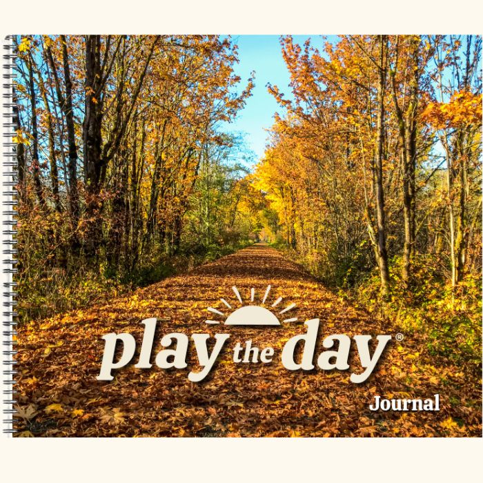 Play the Day® journal cover showing autumn leaves on Snoqualmie Valley Regional Trail