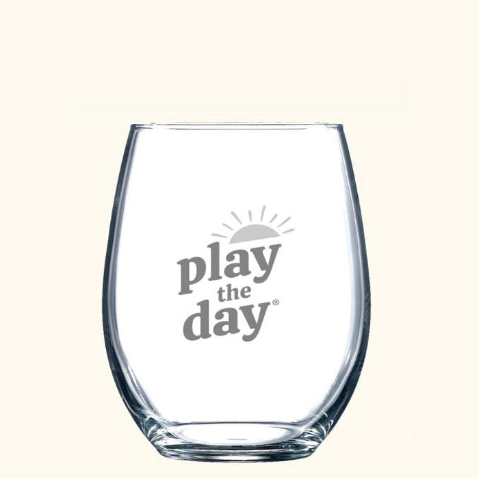9 oz stemless wine glass with etched Play the Day® logo, part of a set of two